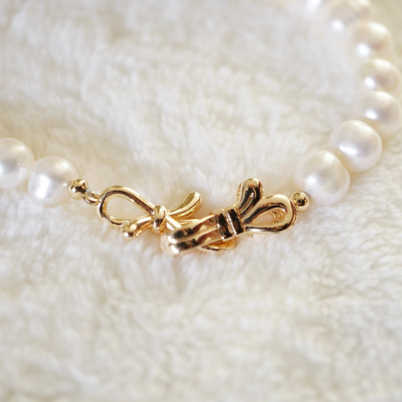 Natural Pearl Necklace with Bow Clasp