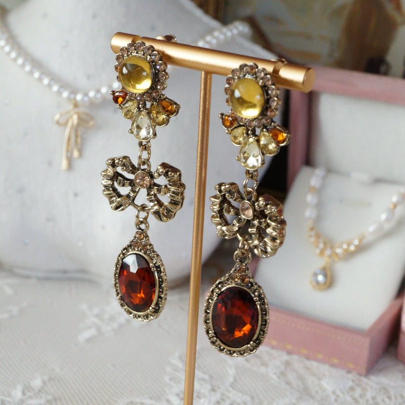 Amber Drop and Dangle Earrings with Bow Design