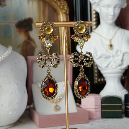 Amber Drop and Dangle Earrings with Bow Design