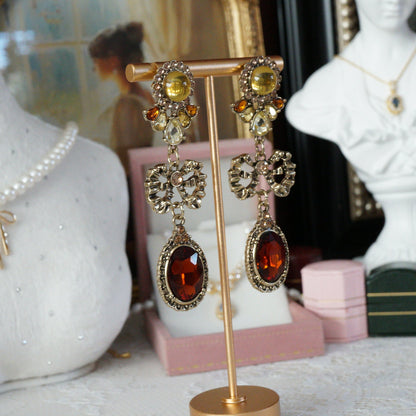 Amber Drop and Dangle Earrings with Bow Design