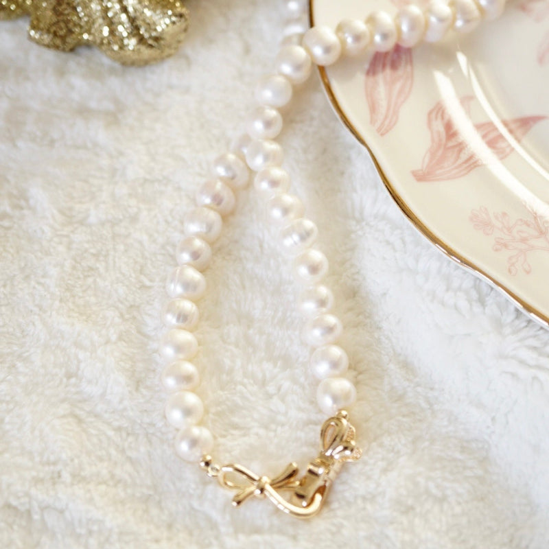 Natural Pearl Necklace with Bow Clasp