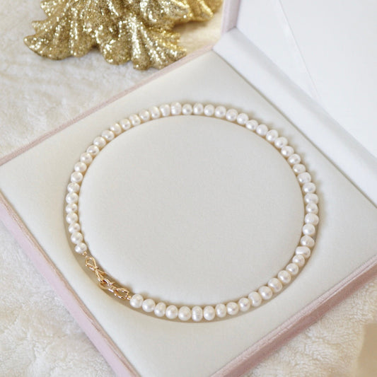 Natural Pearl Necklace with Bow Clasp