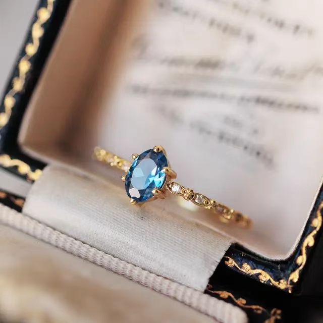 18k Blue Topaz Ring